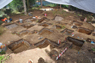 Voir l’image agrandit de Puits de fouilles et déposition stratigraphique complexe des sols sur le site du peuple de l'ocre (EkCw-004).